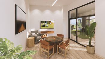 A modern living room with a wooden table and chairs, a flat screen TV, and a large window with a view of the outdoors.